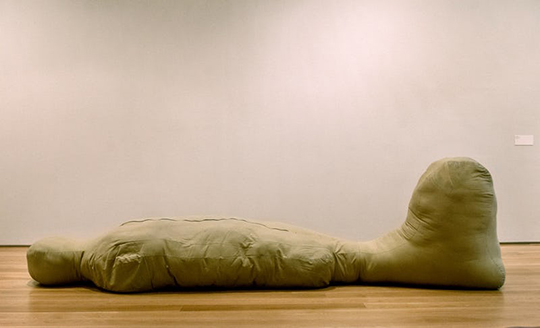 Fabric sculpture by Sterling Ruby titled 'Laying Figure'