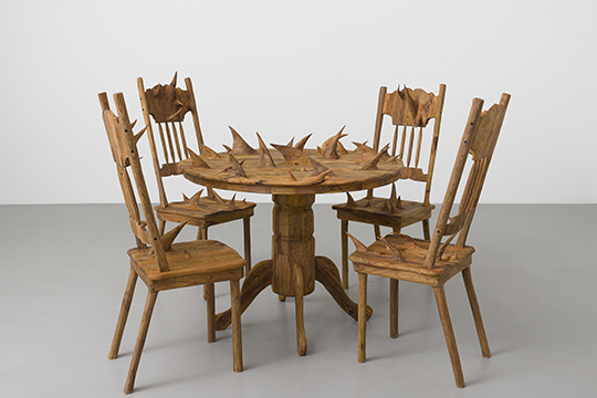 Wooden, spiked chairs and table
