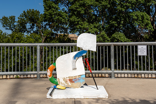 Eddie Martinez's untitled bronze sculpture installed out on the Thomsen Overlook, a scenic plaza on Dallas's Katy Trail 