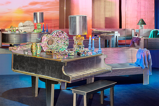 Installation view of Blue Room. Faux abalone piano, guitar, lamp, vases, ash tray, candles and jewelry