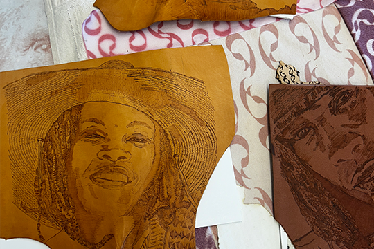 laser cut leather of a woman's face