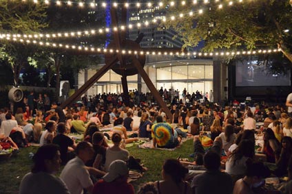 Museum guests enjoy live music and film screenings in the Nasher Garden.